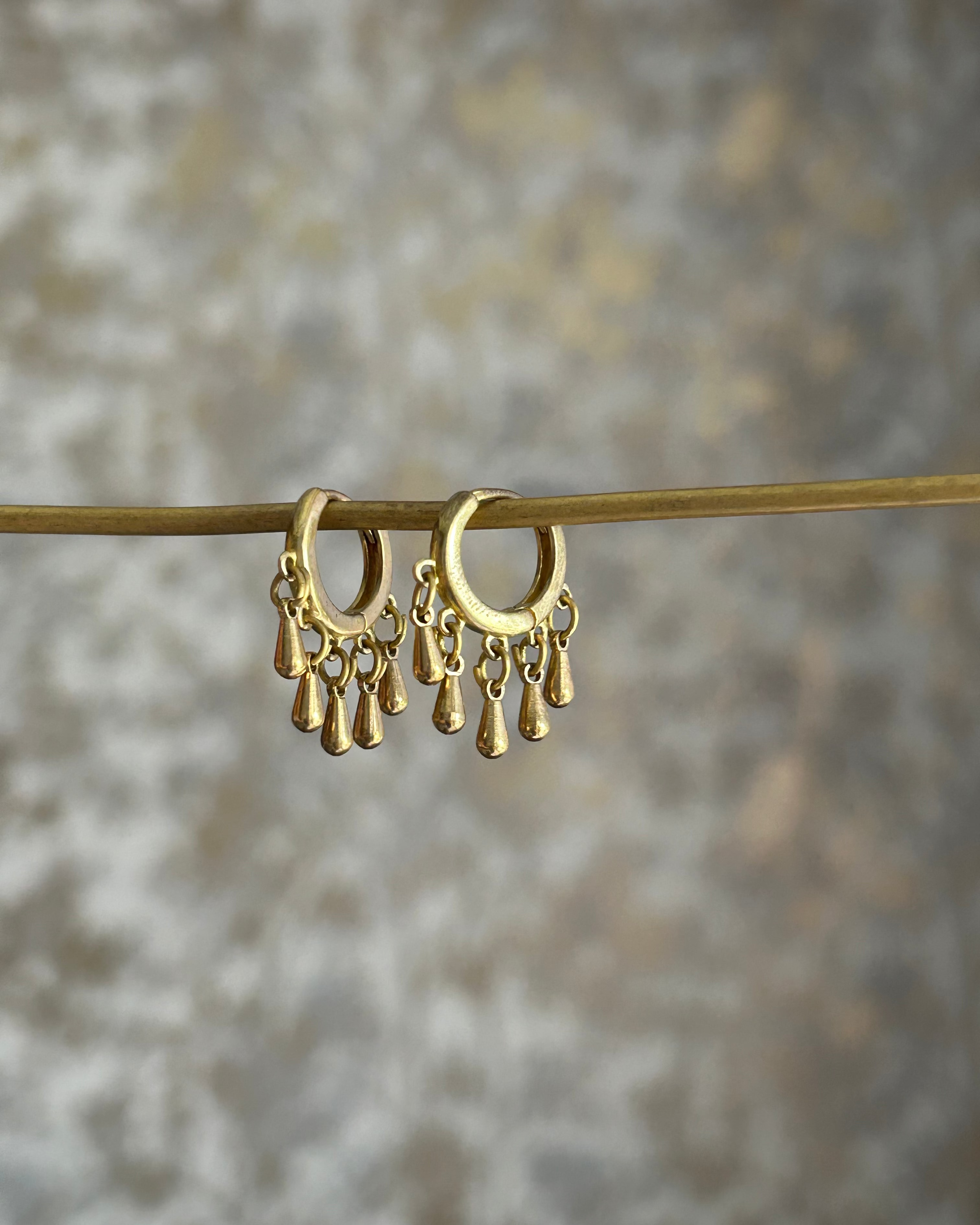 Brass earrings handmade by A Creator's Studio