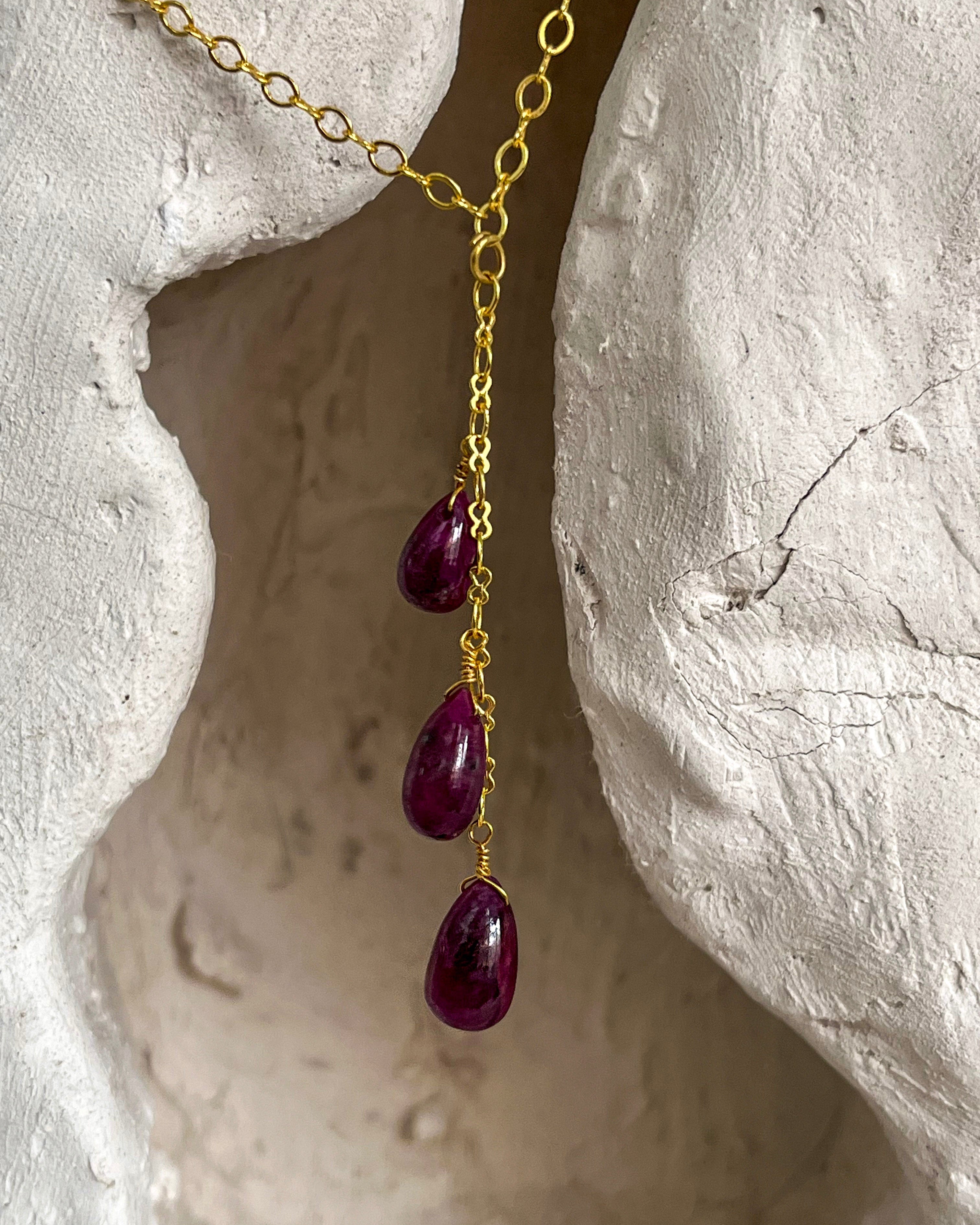 Gold Plated necklace with three teardrop shaped rubies handmade by A Creator's Studio