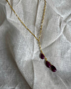 Gold Plated necklace with three teardrop shaped rubies handmade by A Creator's Studio