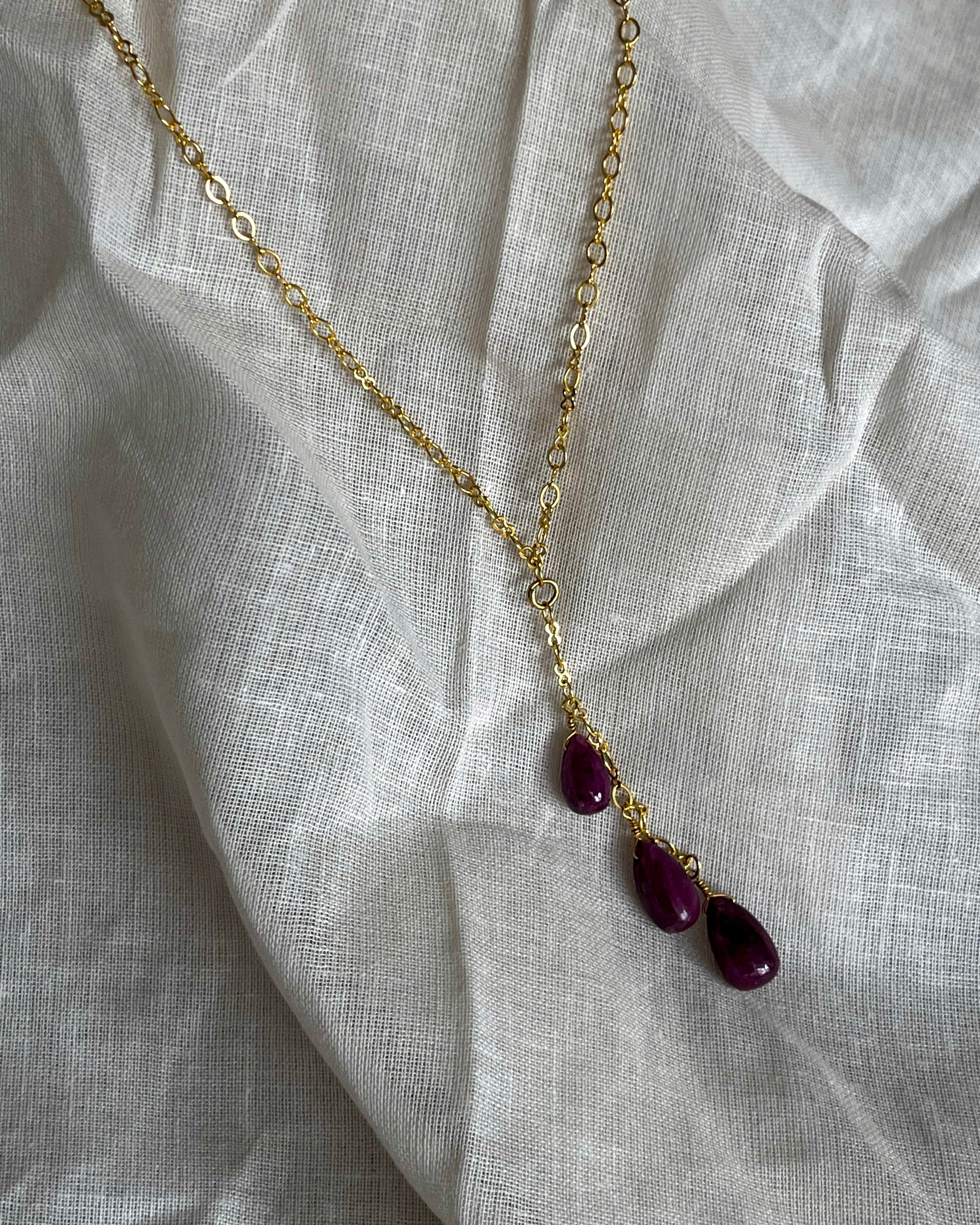 Gold Plated necklace with three teardrop shaped rubies handmade by A Creator's Studio