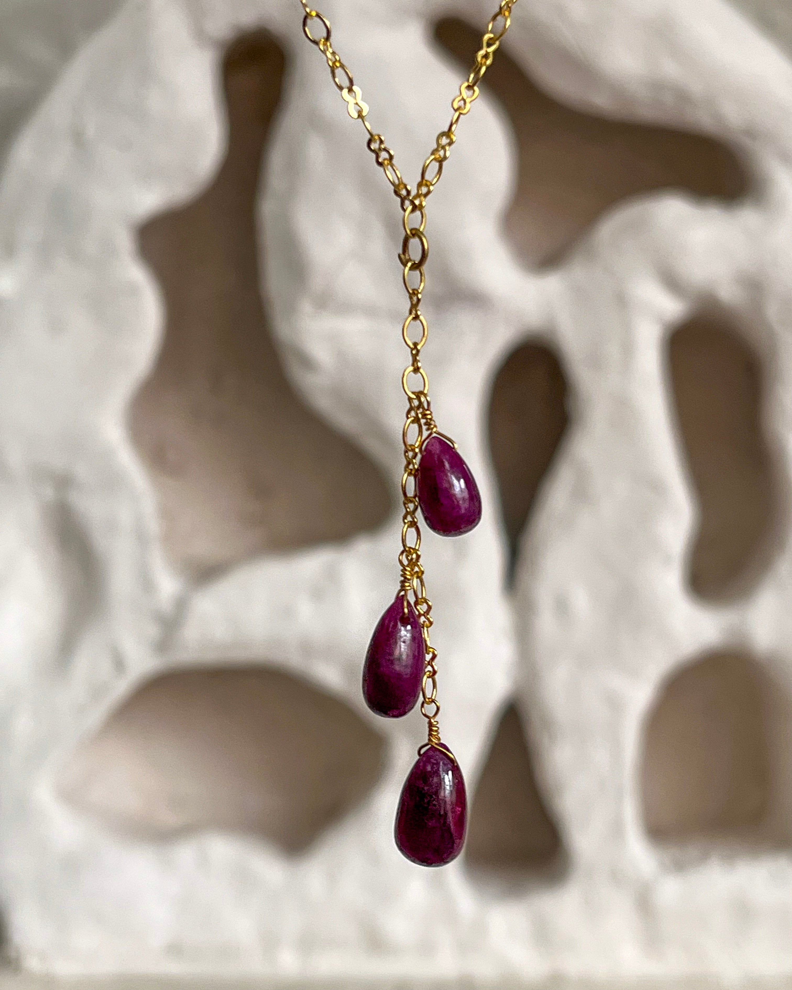 Gold Plated necklace with three teardrop shaped rubies handmade by A Creator's Studio