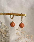 Brass earrings with unique sandstone crystal design handmade by A Creator's Studio 