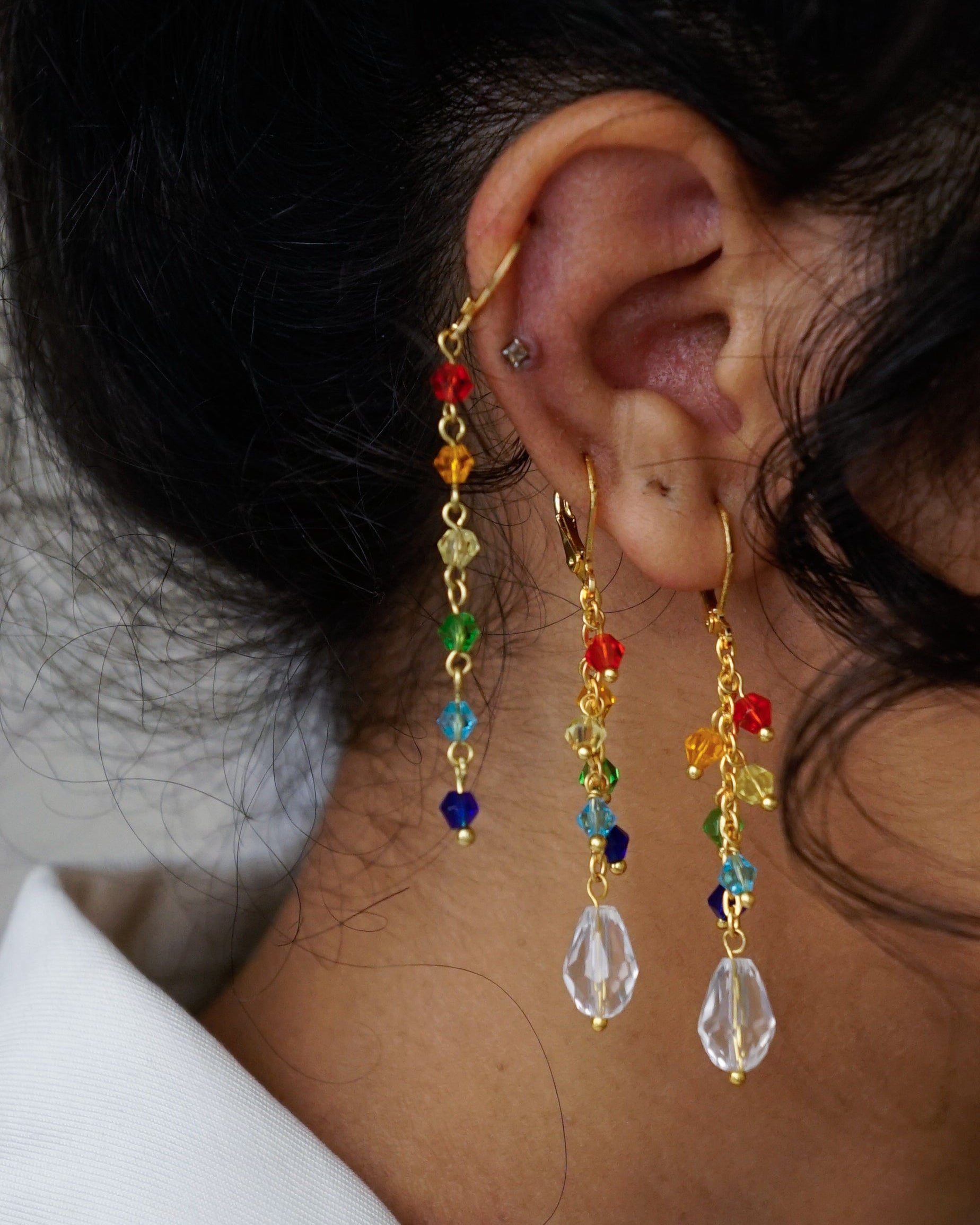Gold Plated Astral rainbow earrings made with rainbow coloured glass beads handmade by A Creator's Studio
