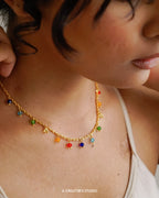Gold plated necklace with rainbow coloured beads handmade by A Creator's Studio