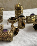 Brass box (dibbi) pendant with a turquoise in the centre with a chain handmade by A Creator's Studio