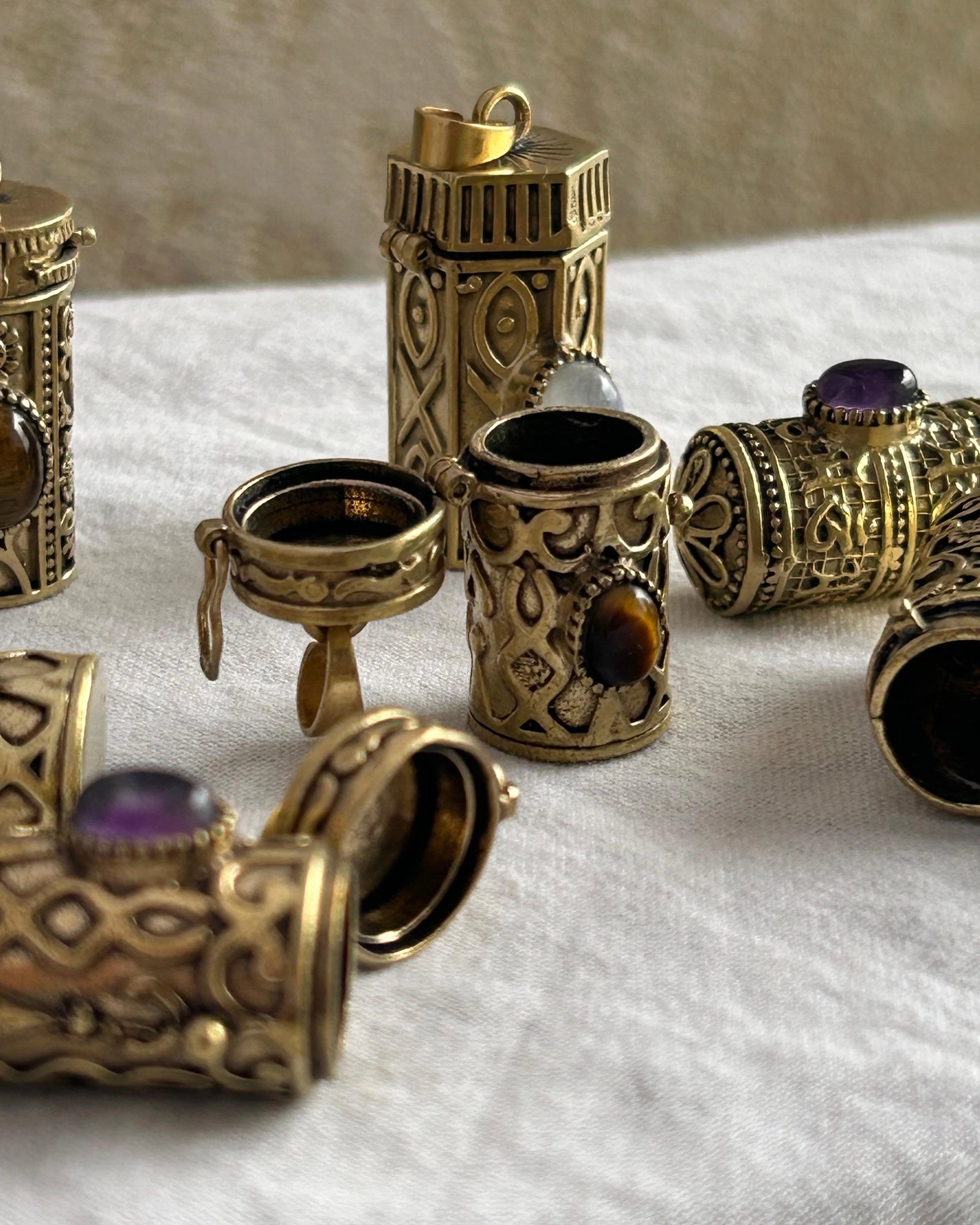 Brass box (dibbi) pendant with a turquoise in the centre with a chain handmade by A Creator's Studio