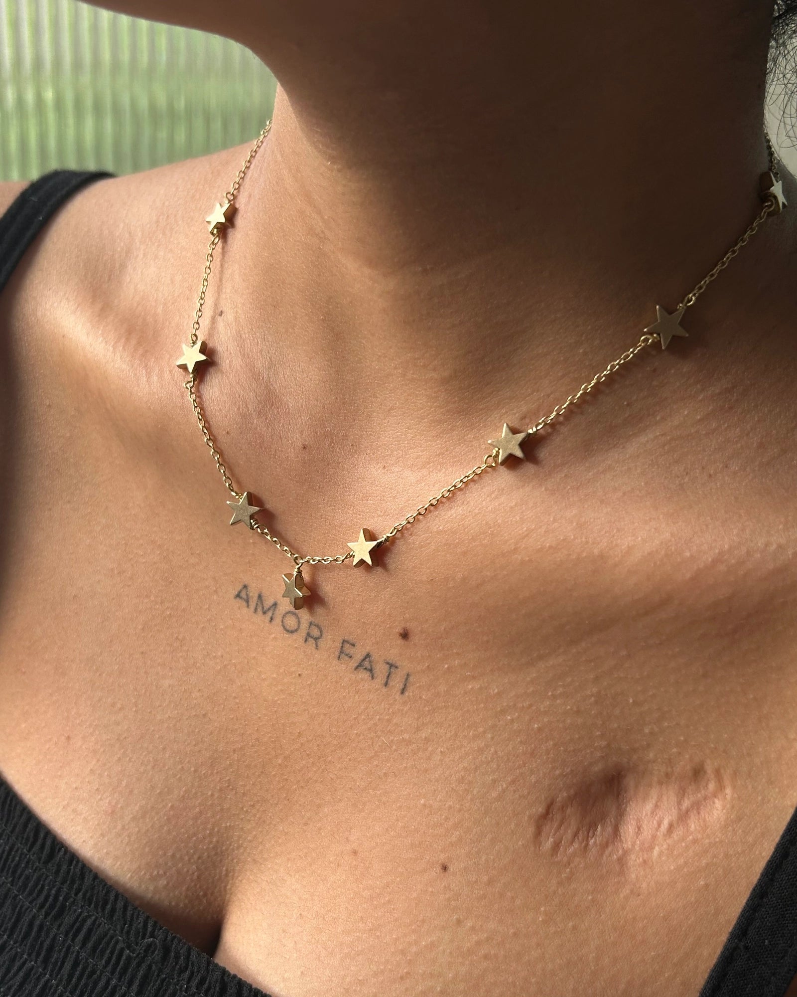 Brass star link choker with stars linked together handmade by A Creator's Studio