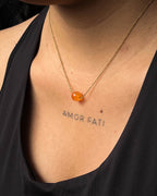 Brass necklace with orange Carnelian crystal bead in the centre handmade by A Creator's Studio