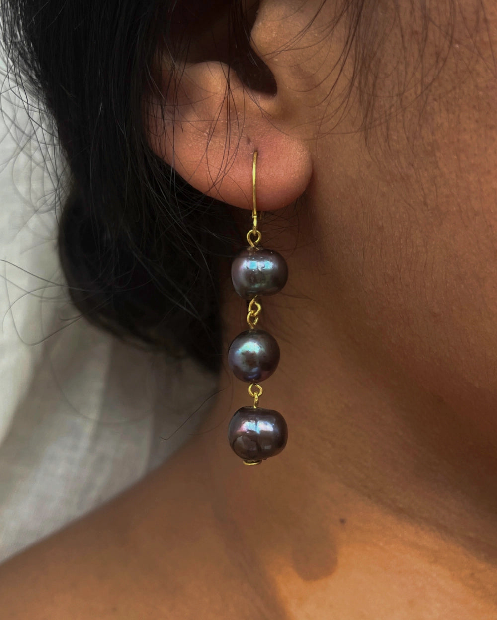 gold plated Classic black pearl dangle earrings with three lustrous black freshwater pearls handmade by A Creator's Studio