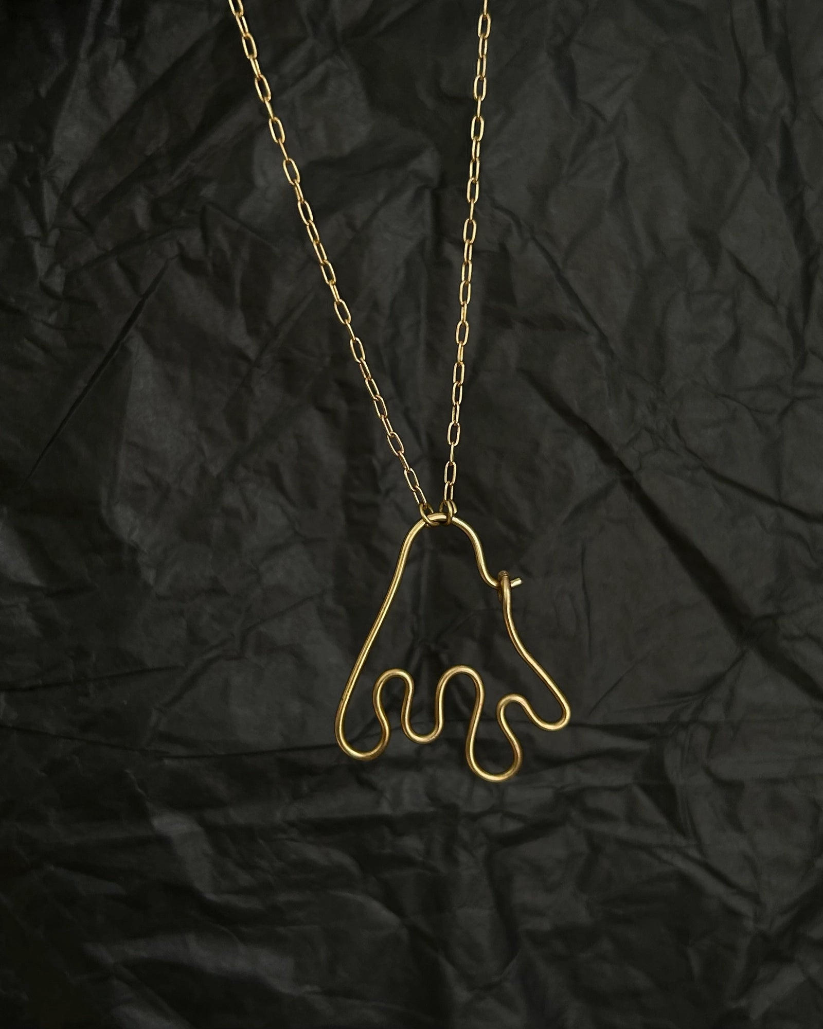 Brass wired charm holder necklace with a chain handmade by A Creator's Studio