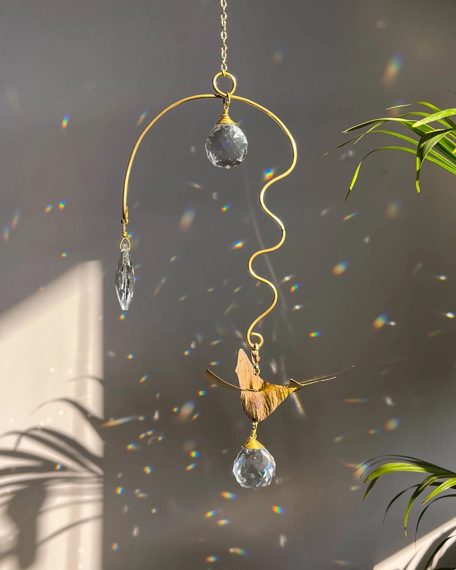 Brass wired bird suncatcher with clear crystals handmade by A Creator's Studio
