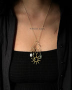 Brass wired charm holder necklace with a chain handmade by A Creator's Studio