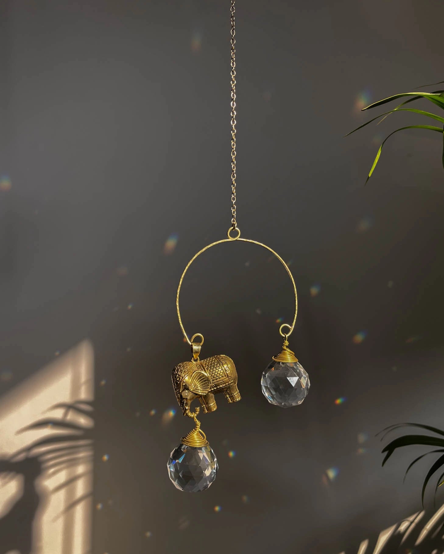 Elephant sun catcher with glass crystal drops and a labradorite gemstone, handmade by A Creator's Studio