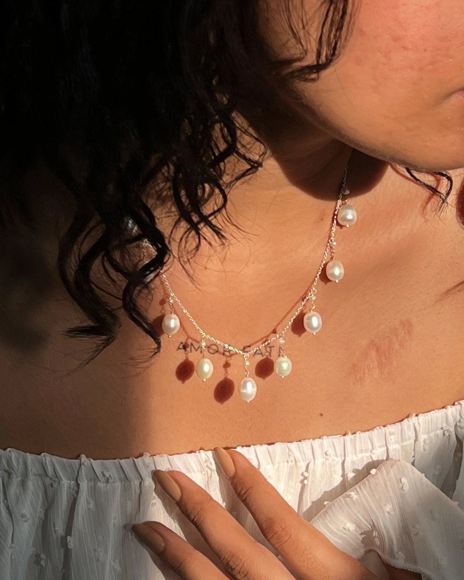 Sterling Silver pearl necklace with multiple freshwater pearl drop links handmade by A Creator's Studio