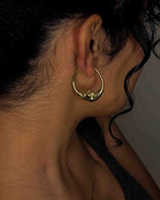 Brass crescent moon hoop earrings handmade by A Creator's Studio