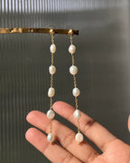Gold Plated white pearl dangle earrings with multiple freshwater pearl links handmade by A Creator's Studio