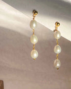 Gold Plated Pearl dangle earrings with three linked freshwater pearls handmade by A Creator's Studio