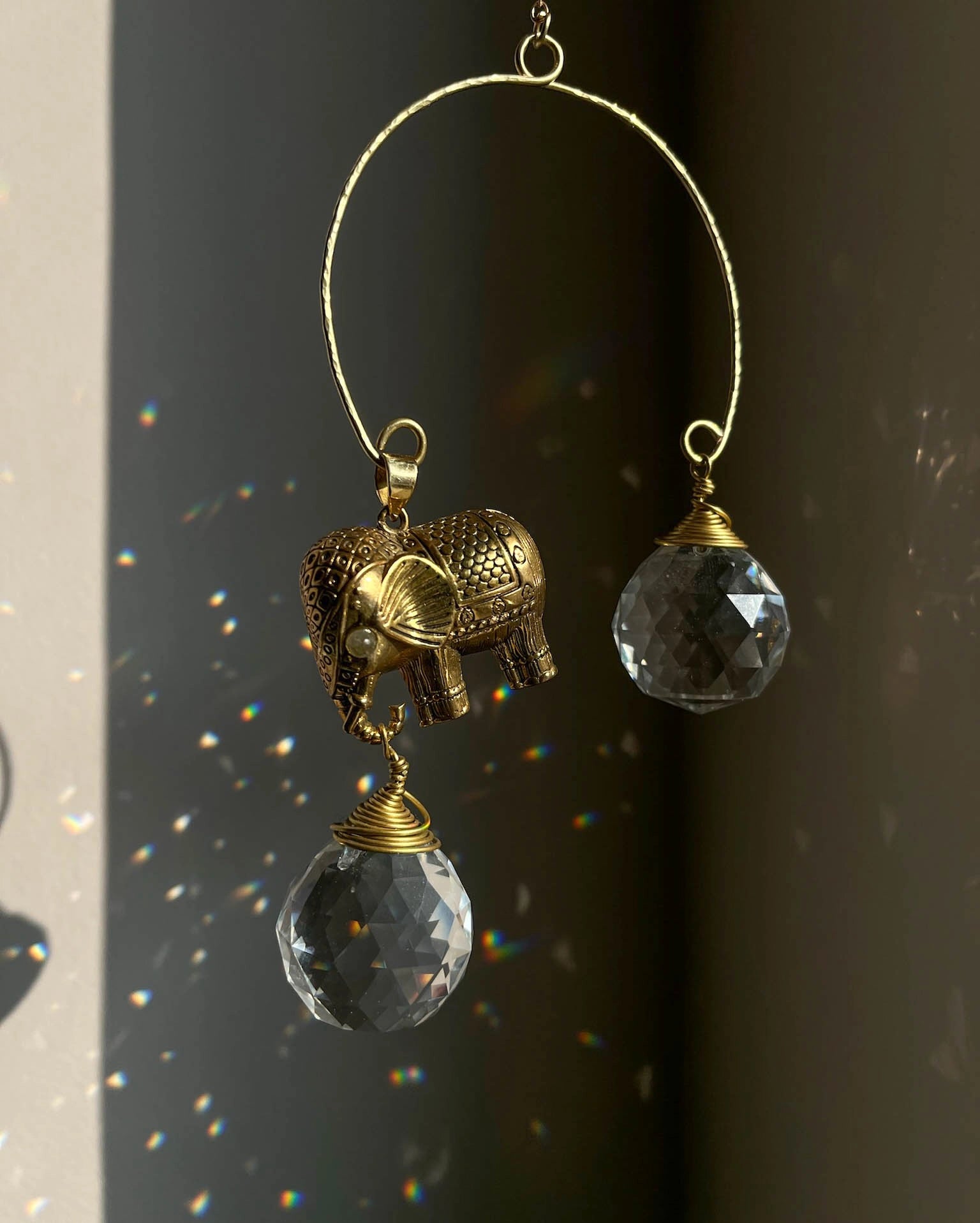 Elephant sun catcher with glass crystal drops and a labradorite gemstone, handmade by A Creator's Studio