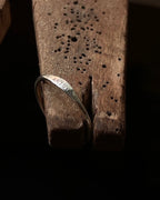 Silver ring with 'clay' engraving, handmade by A Creator's Studio