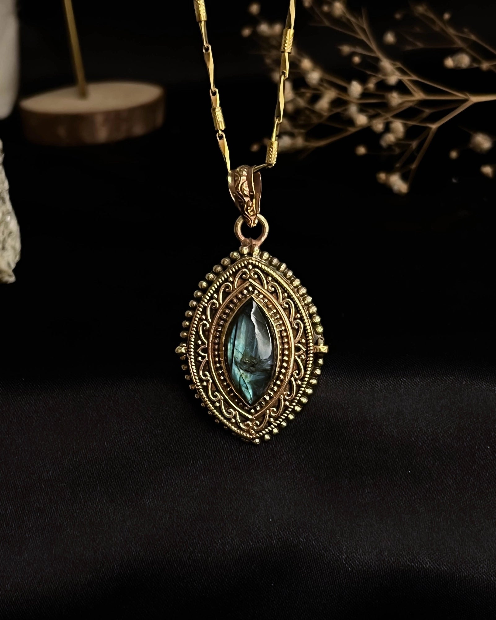Brass box (dibbi) pendant with a large labradorite sitting in the centre with a chain handmade by A Creator's Studio
