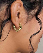 Brass heart hoop earrings handmade by A Creator's Studio