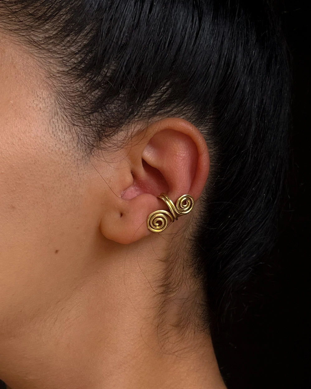 Brass Spiral Ear Cuff handmade by A Creator's Studio