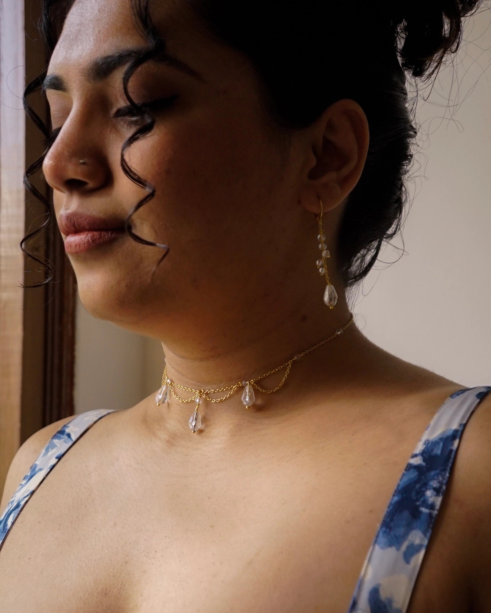 Gold Plated clear crystal dangle earring with a crystal teardrop handmade by A Creator's Studio