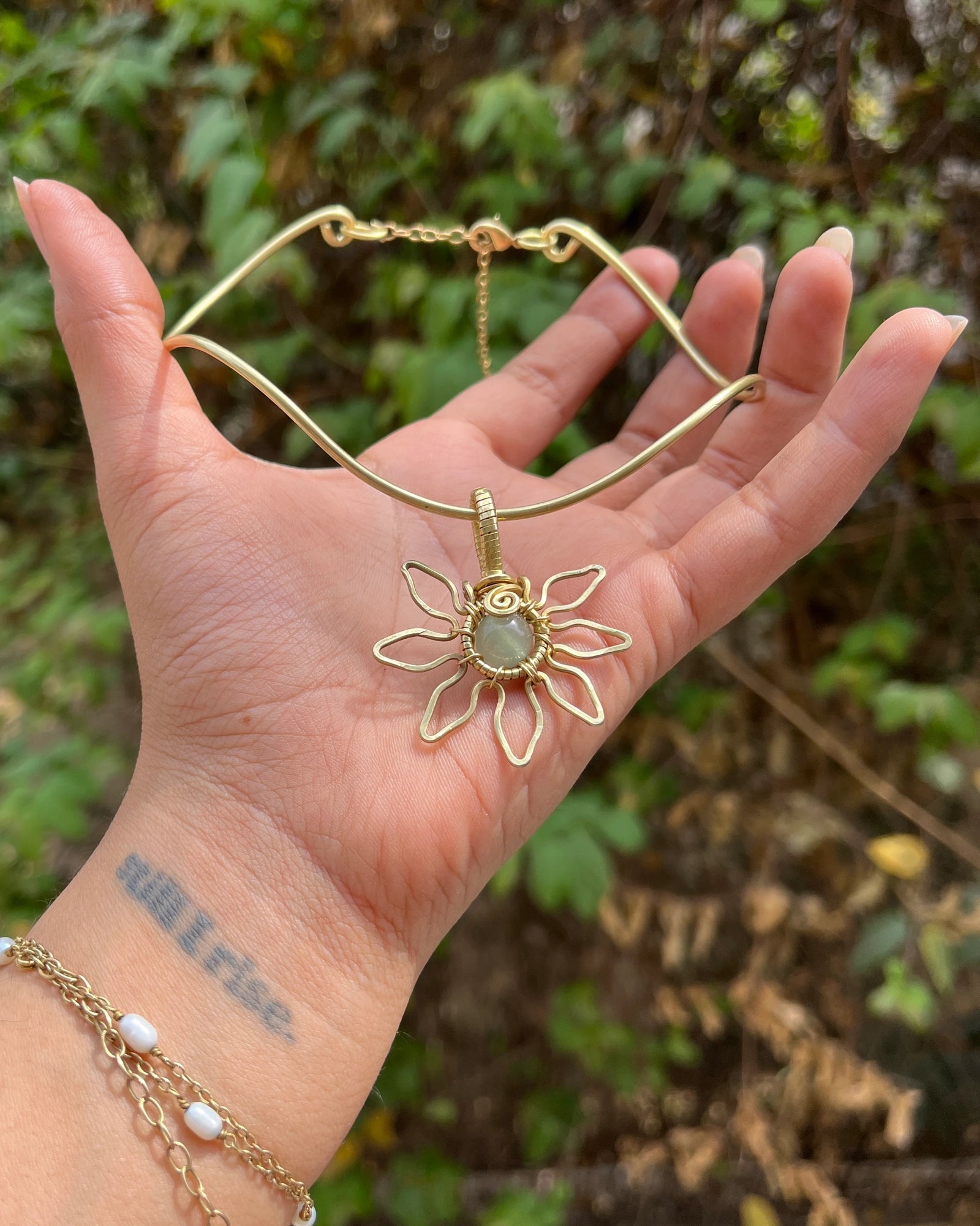 Brass wired sunflower choker with gemstone in the centre handmade by A Creator's Studio