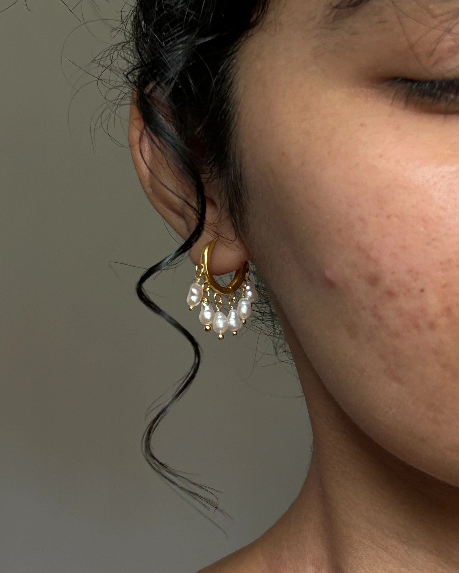 gold plated White lustrous freshwater pearl chandelier earrings with multiple freshwater pearl drops handmade by A Creator's Studio