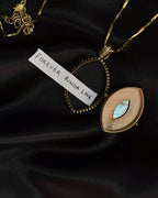 Brass box (dibbi) pendant with a large labradorite sitting in the centre with a chain handmade by A Creator's Studio