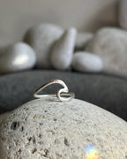 Silver ring with a wave in the centre handmade by A Creator's Studio