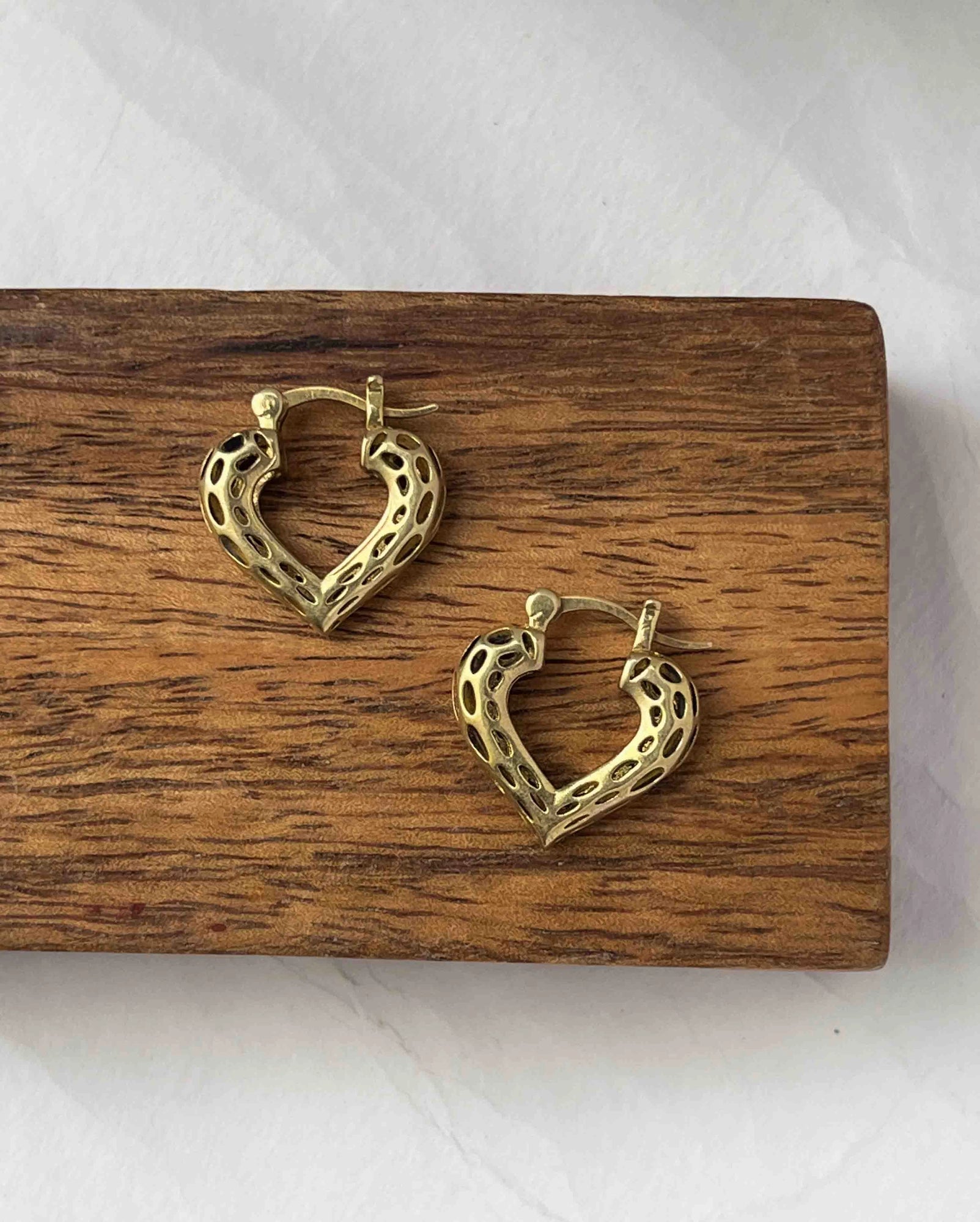 Brass heart hoop earrings handmade by A Creator's Studio