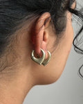 Brass dagger hoop earrings handmade by A Creator's Studio