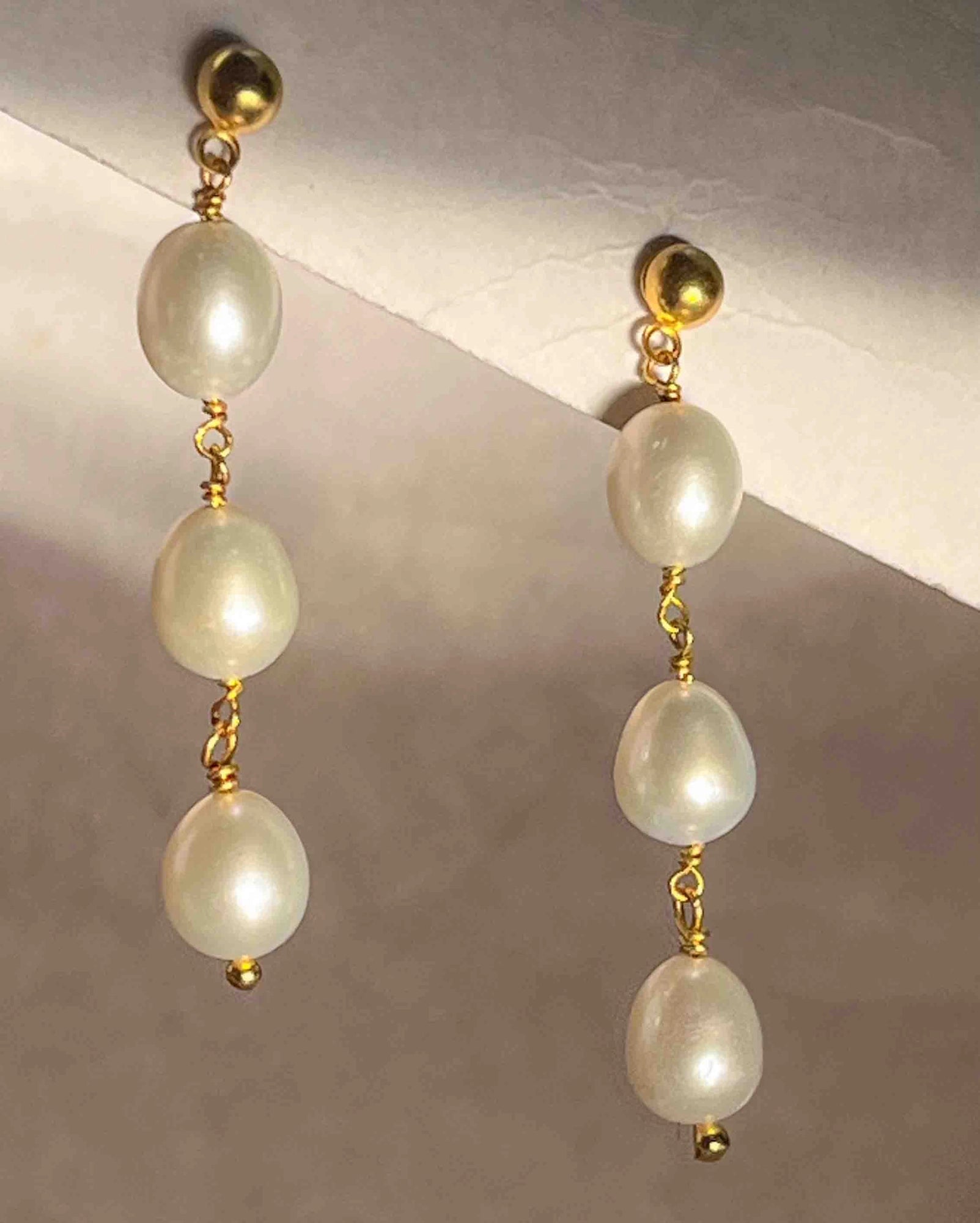 Gold Plated Pearl dangle earrings with three linked freshwater pearls handmade by A Creator's Studio