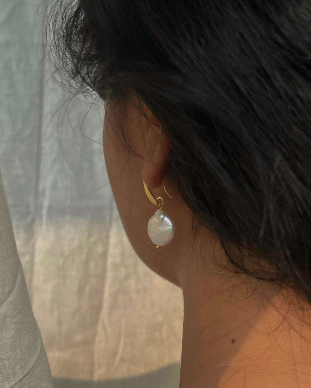 Gold plated freshwater pearl earrings with a freshwater pearl drop handmade by A Creator's Studio