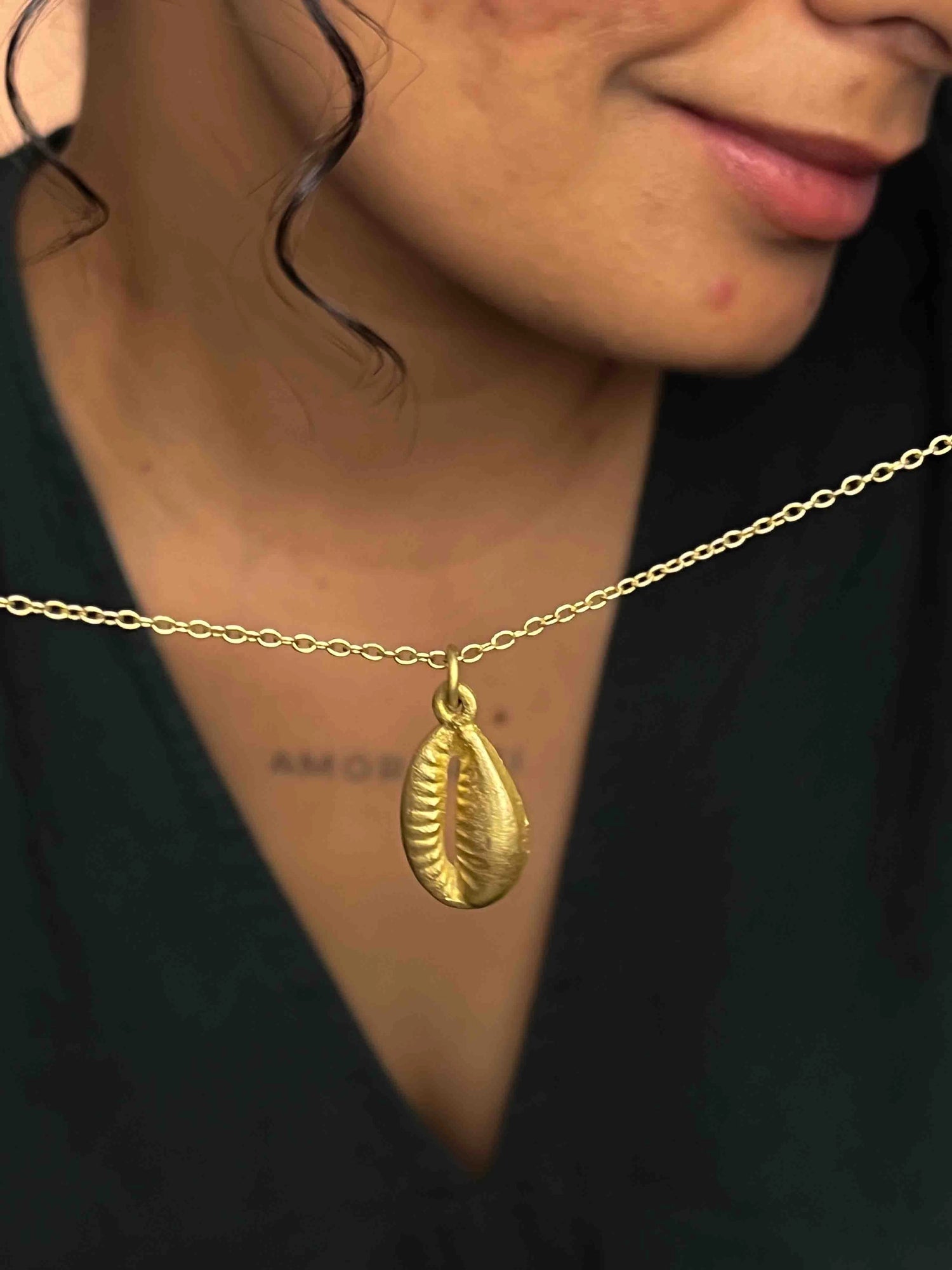 Brass necklace with a coffee bean pendant handmade by A Creator's Studio