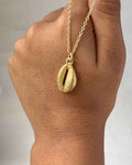 Brass necklace with a coffee bean pendant handmade by A Creator's Studio