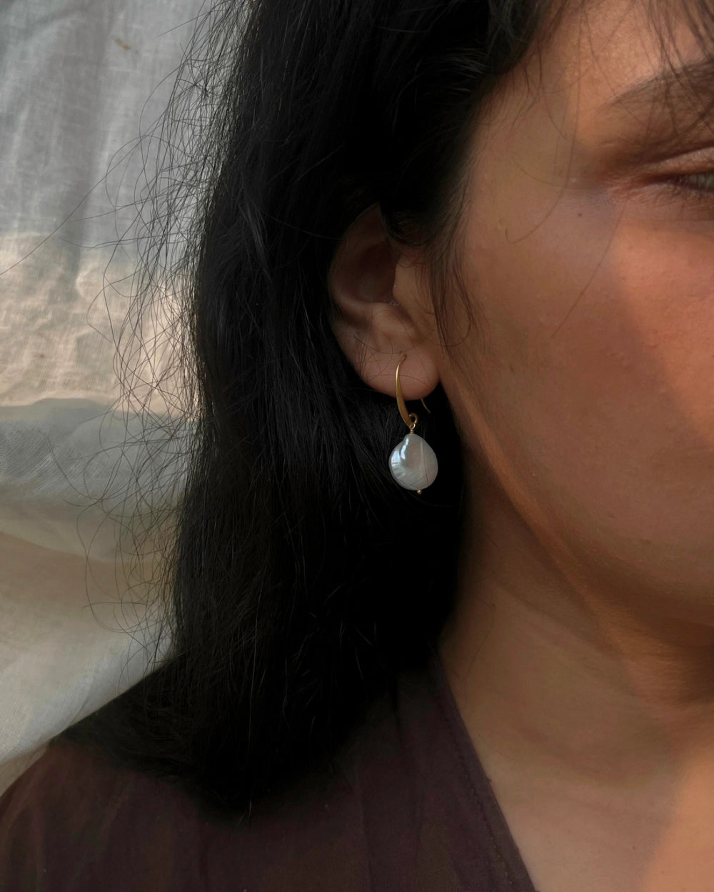 Gold plated freshwater pearl earrings with a freshwater pearl drop handmade by A Creator's Studio