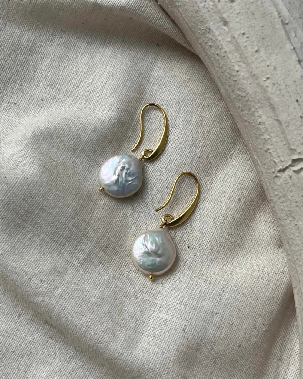 Gold plated freshwater pearl earrings with a freshwater pearl drop handmade by A Creator's Studio