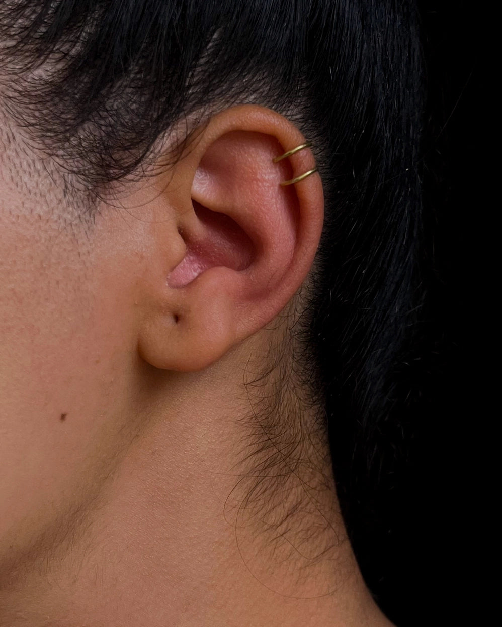 Brass double piercing ear cuff handmade by A Creator's Studio
