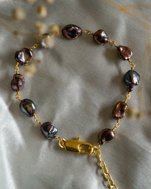 lustrous and Rare Black Fresh Water Pearls linked together in 20k Gold Plated Brass handmade by A Creator's Studio