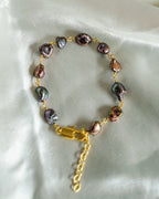 lustrous and Rare Black Fresh Water Pearls linked together in 20k Gold Plated Brass handmade by A Creator's Studio