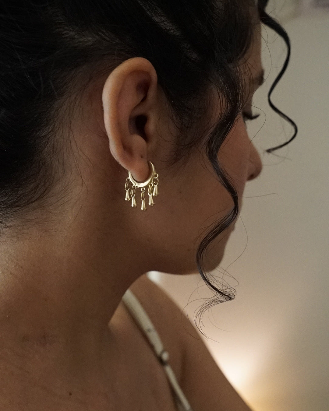Brass earrings handmade by A Creator's Studio