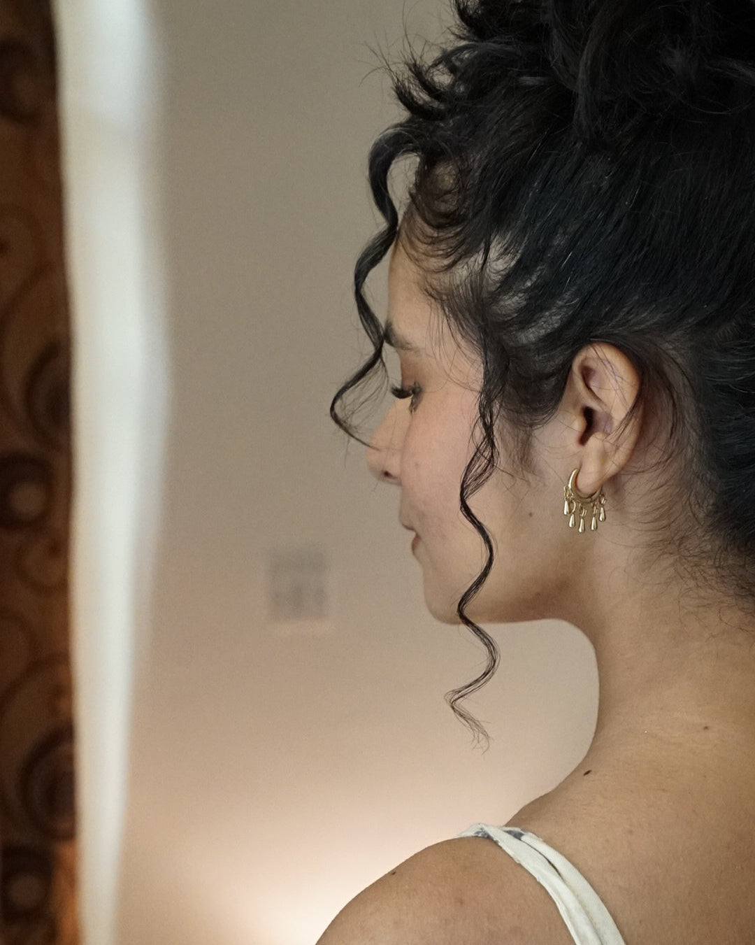 Brass earrings handmade by A Creator's Studio