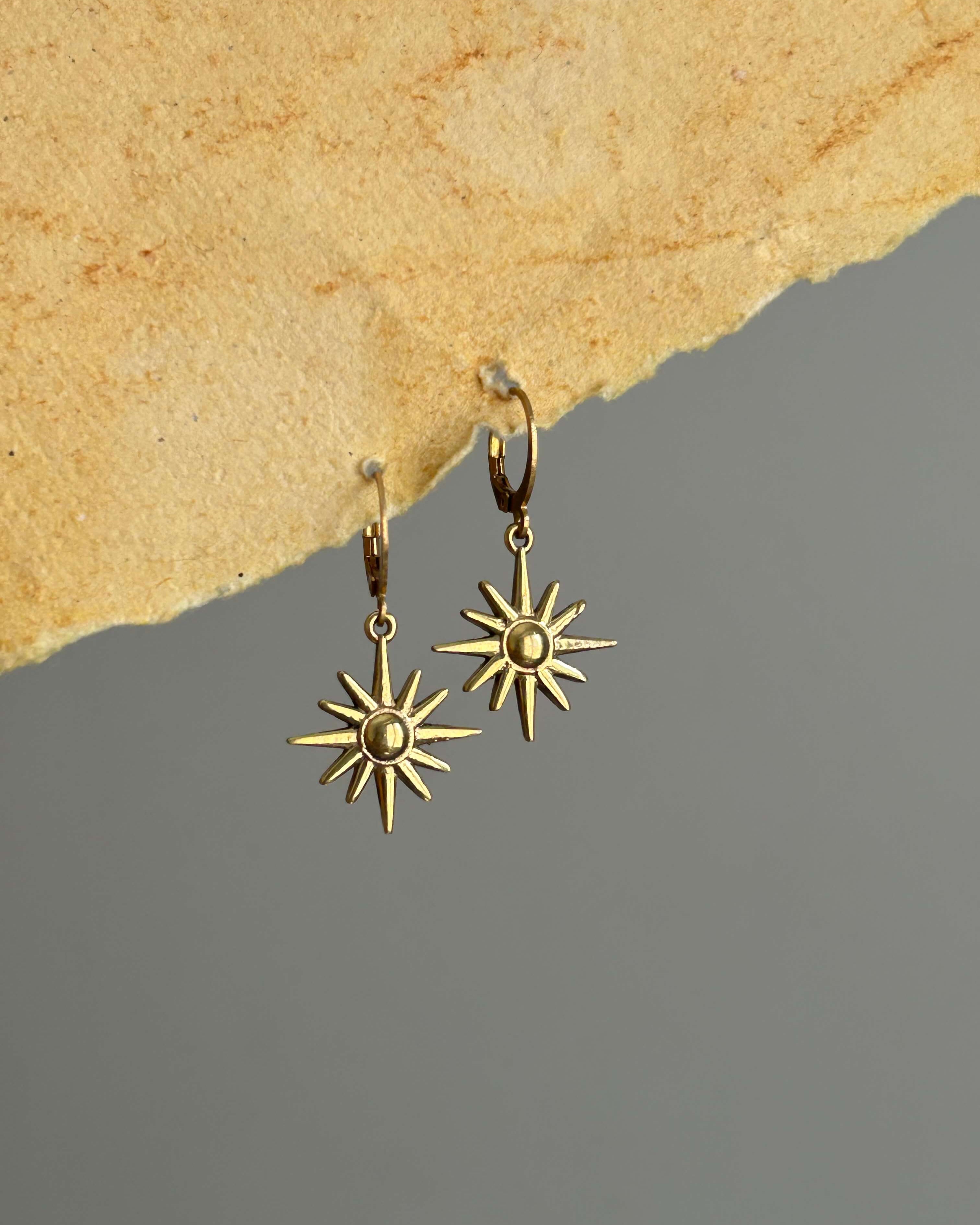 Brass earrings with unique sun design handmade by A Creator's Studio
