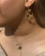 Brass earrings with unique wirewrapped moon design handmade by A Creator's Studio